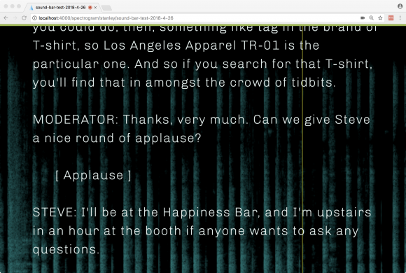 Screenshot of a captioning window with a dynamic audio spectrogram as the complete background.